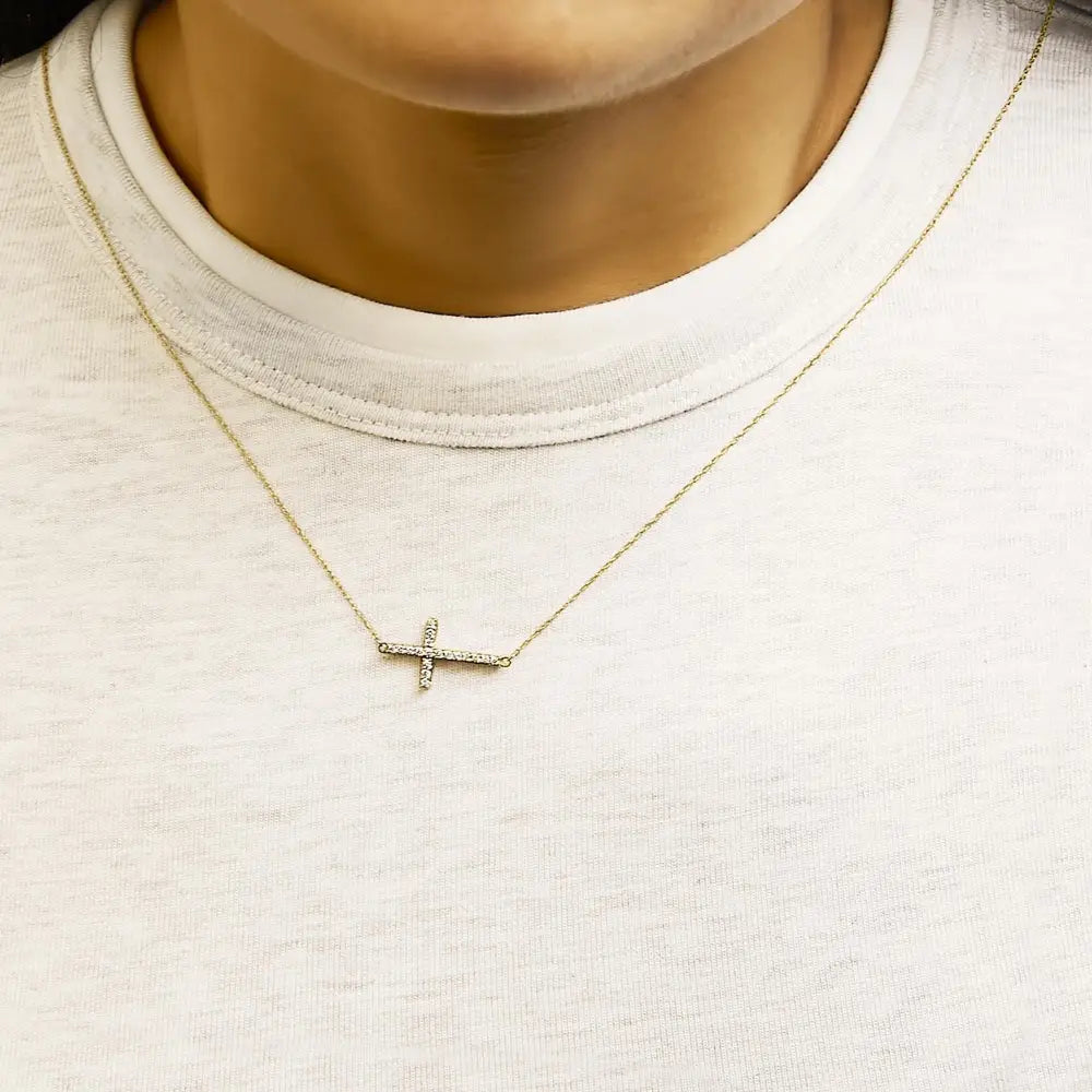 10k yellow gold 1/5 cttw diamond sideways cross necklace 18 inch bijoux-nyc direct