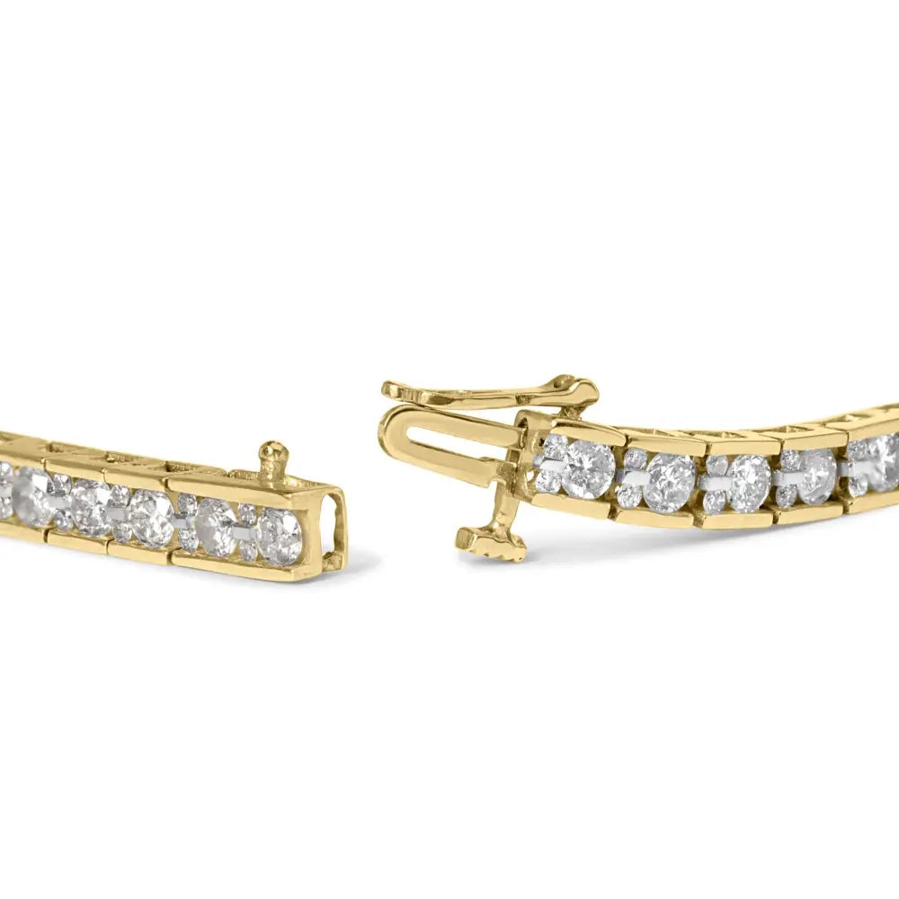 10k yellow gold 4.00 cttw round diamond channel set 7’’ tennis bracelet bijoux-nyc direct