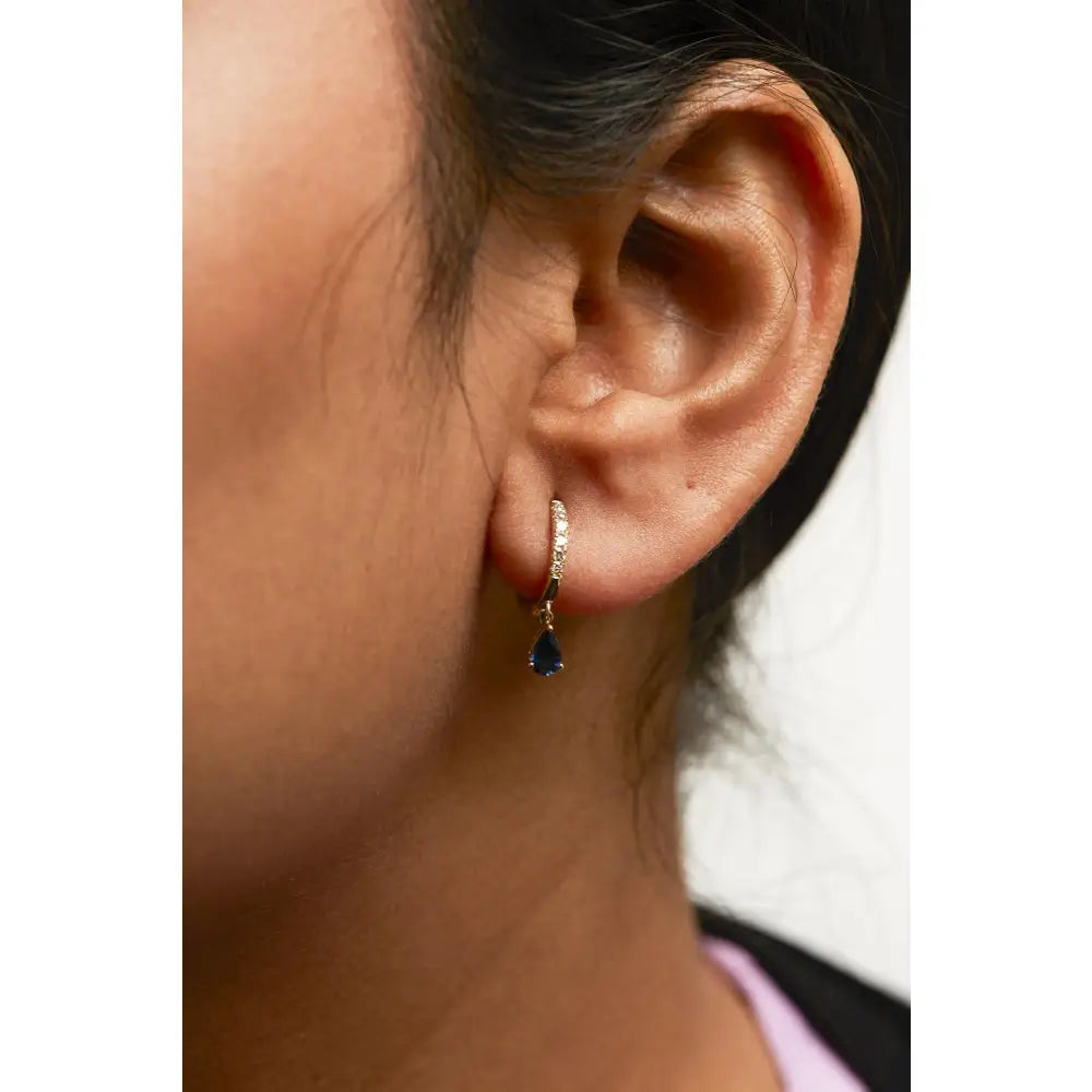Pear blue sapphire & diamond drop huggy hoop earrings in 10k yellow gold – 1/10 cttw bijoux-nyc direct