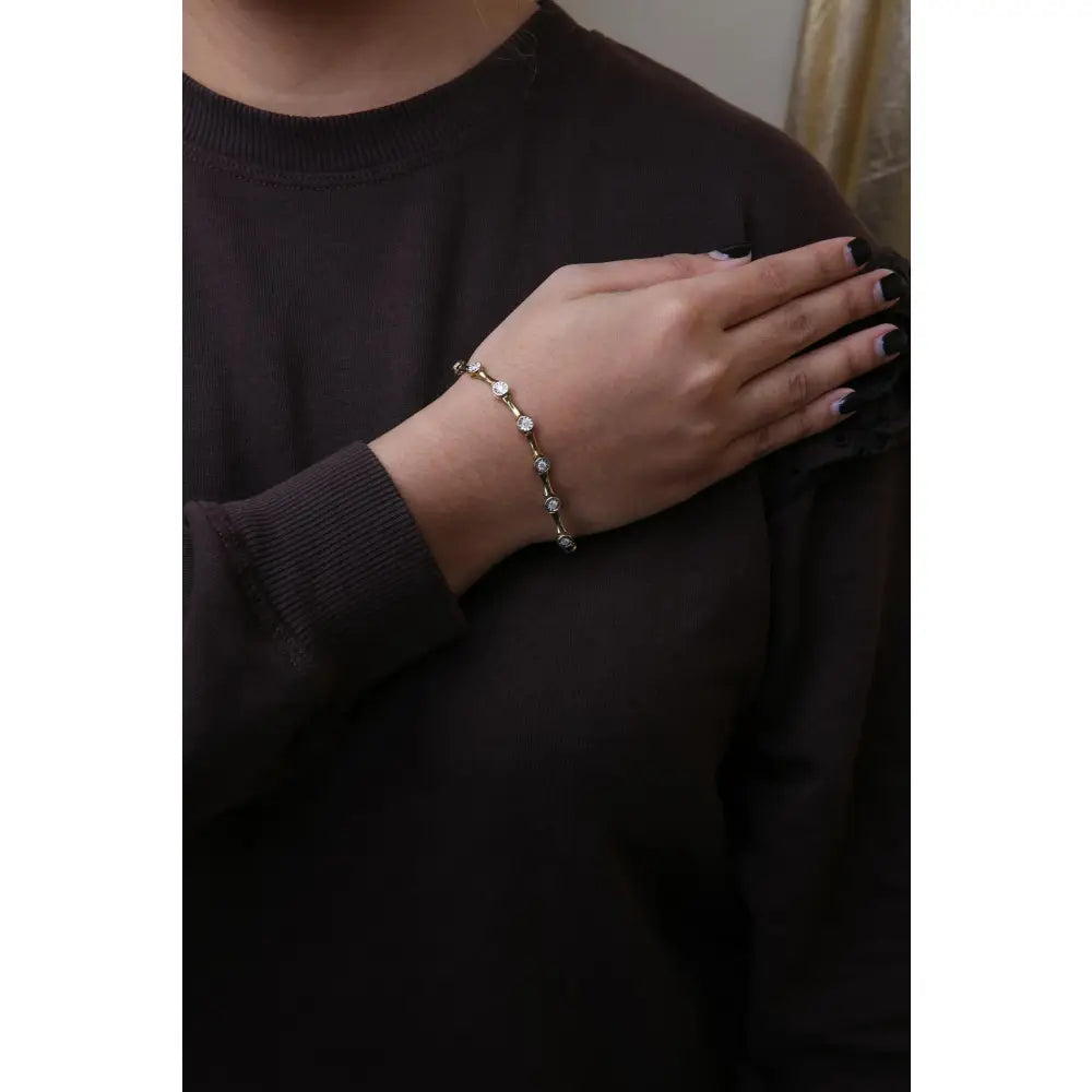1.0 cttw diamond station bracelet in 10k yellow gold over sterling silver bijoux-nyc direct