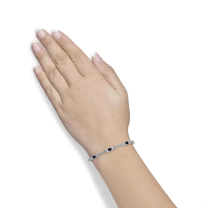 14k white gold 1/2 cttw diamond & oval blue sapphire braided link bracelet (g h color vs1 vs2 clarity) 7’’ inches