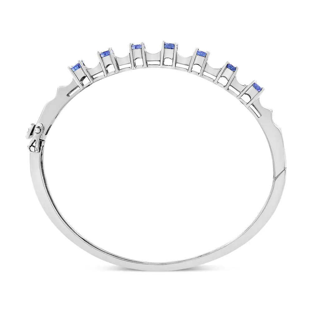 Oval tanzanite and 1/4 cttw diamond bangle bracelet in 14k white gold bijoux-nyc direct