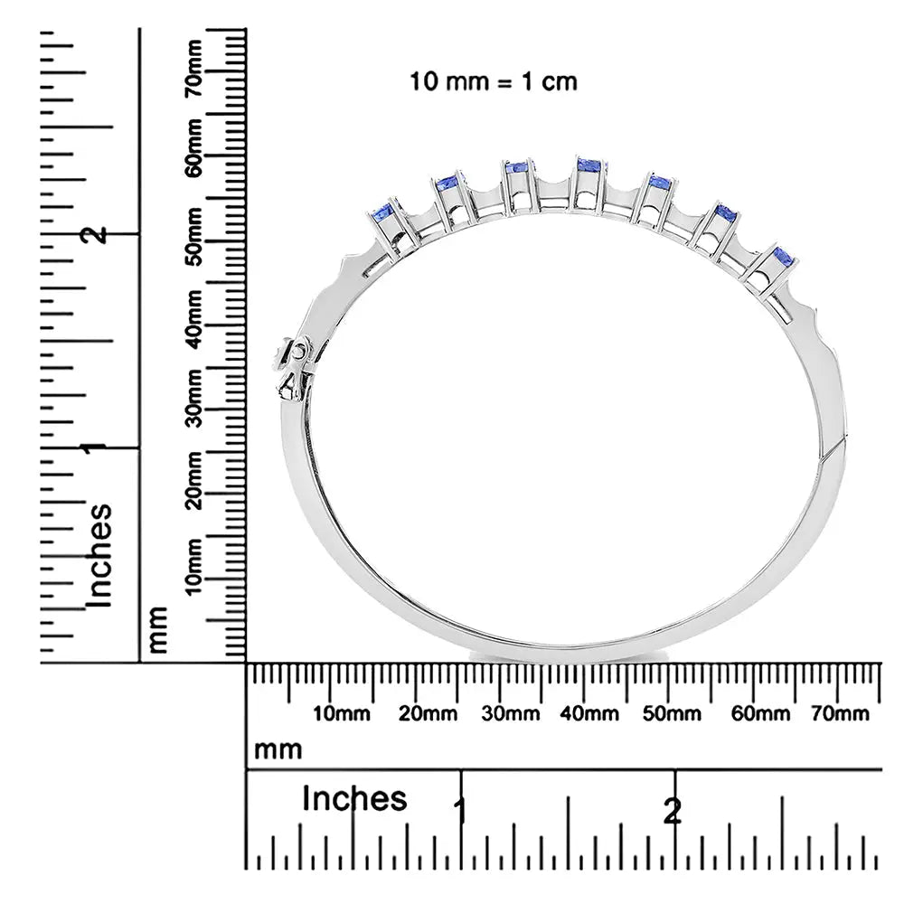 Oval tanzanite and 1/4 cttw diamond bangle bracelet in 14k white gold bijoux-nyc direct