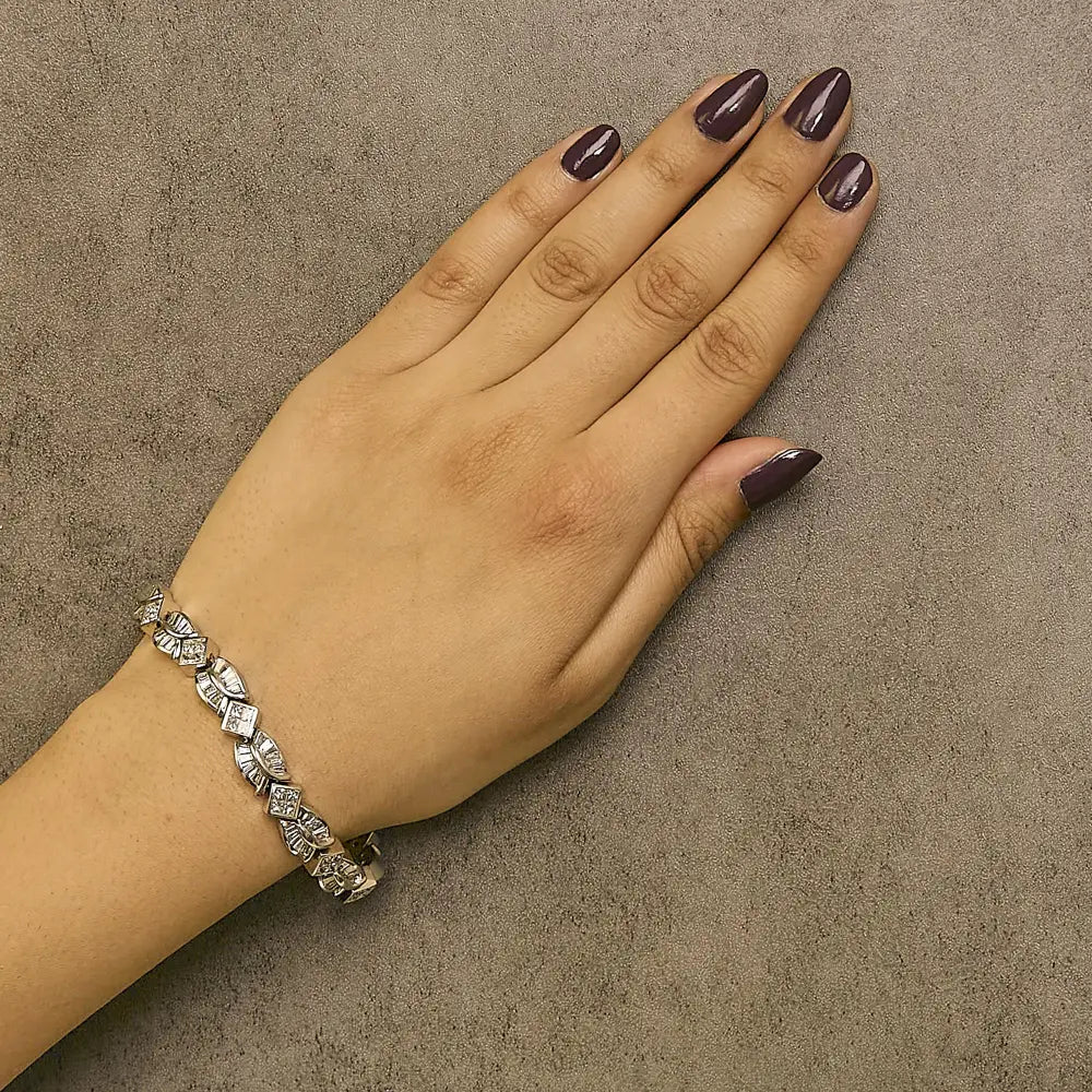 14k white gold 8 5/8ct princess and baguette diamond twist bracelet 7 bijoux-nyc direct