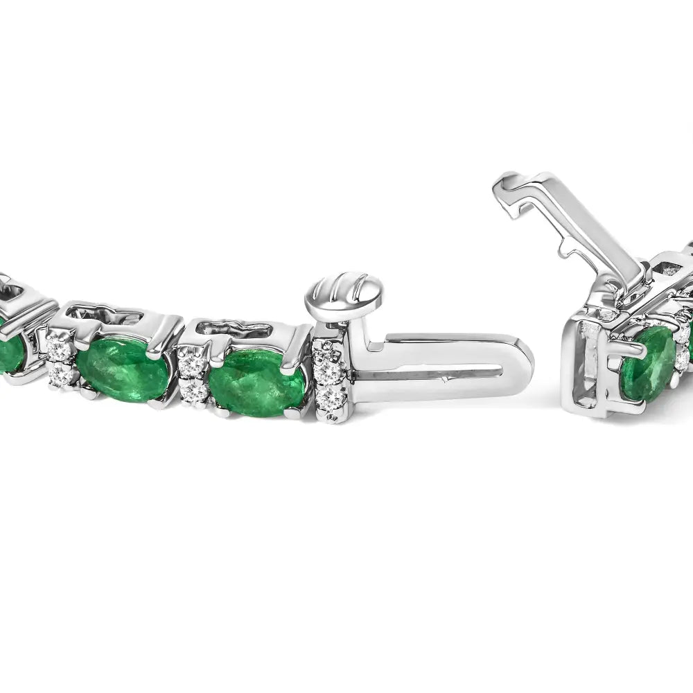 14k white gold oval emerald and round diamond tennis bracelet bijoux-nyc direct