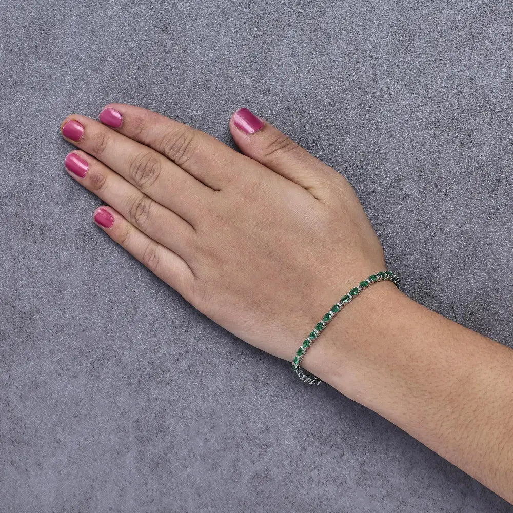 14k white gold oval emerald and round diamond tennis bracelet bijoux-nyc direct