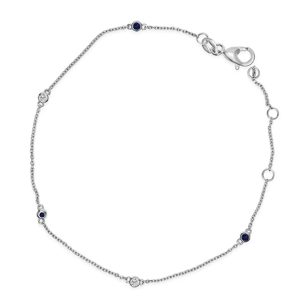 14k white gold blue sapphire and diamond bezel station bracelet 7.5 inch bijoux-nyc direct