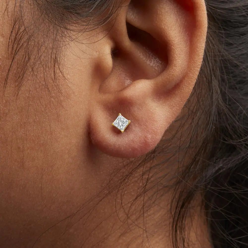 Princess cut diamond solitaire stud earrings in 14k yellow gold – 1/2 cttw bijoux-nyc direct