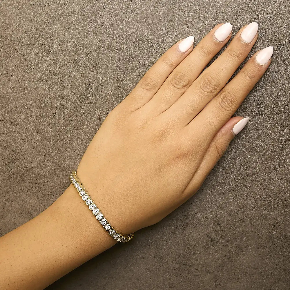 8.00 cttw diamond tennis bracelet in 14k yellow gold 7 inch half bezel bijoux-nyc direct