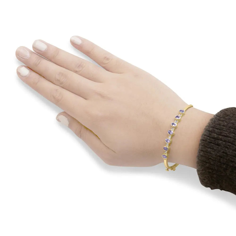 14k yellow gold oval tanzanite and diamond bezel bangle bracelet bijoux-nyc direct