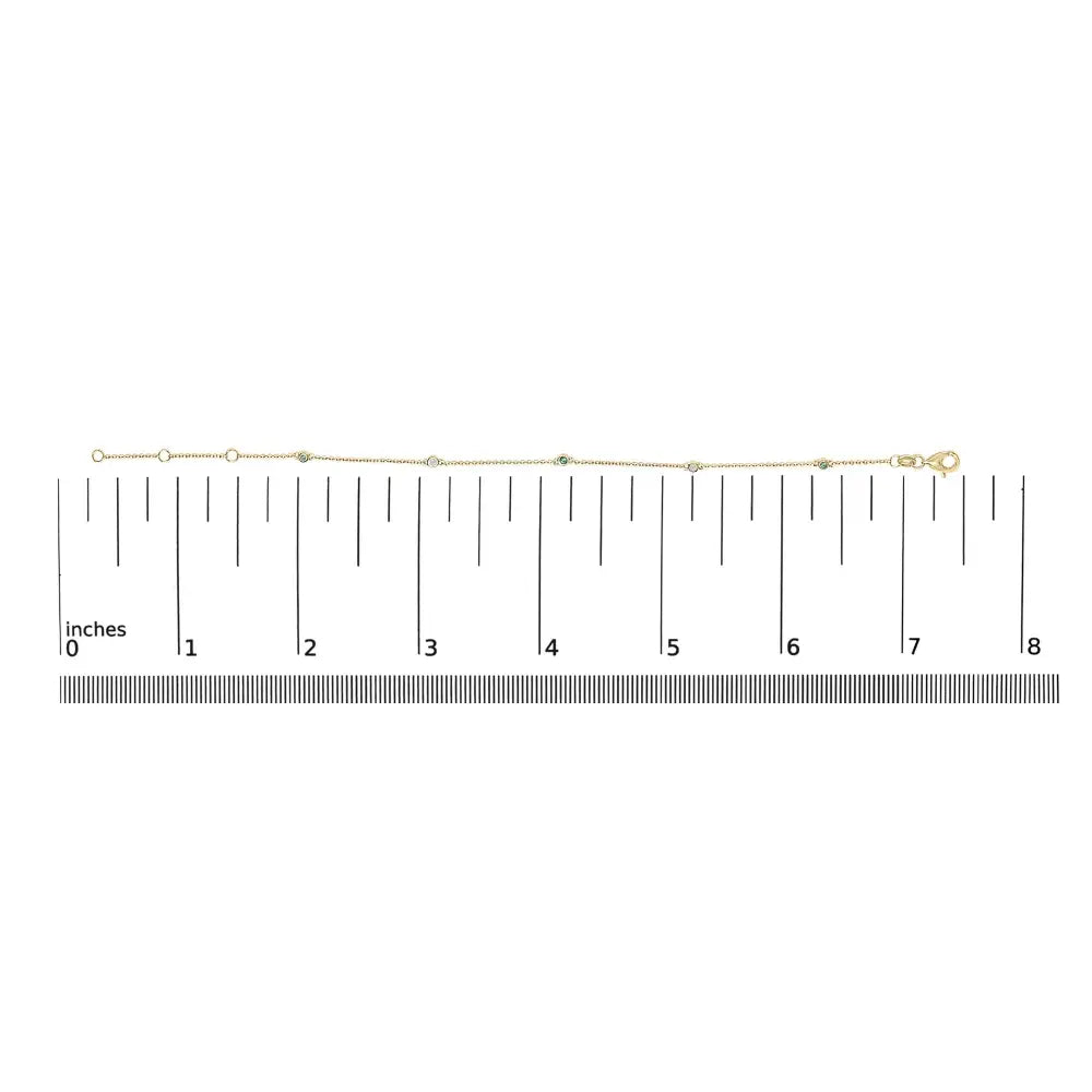 14k yellow gold alternating emerald and diamond bezel station bracelet bijoux-nyc direct