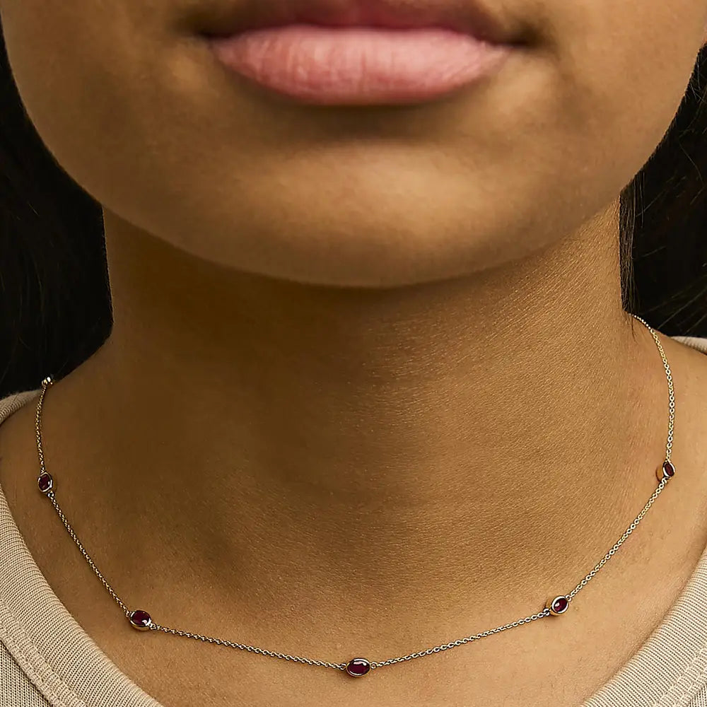 14k yellow gold 7 ruby oval bezel station necklace 18 inches bijoux-nyc direct