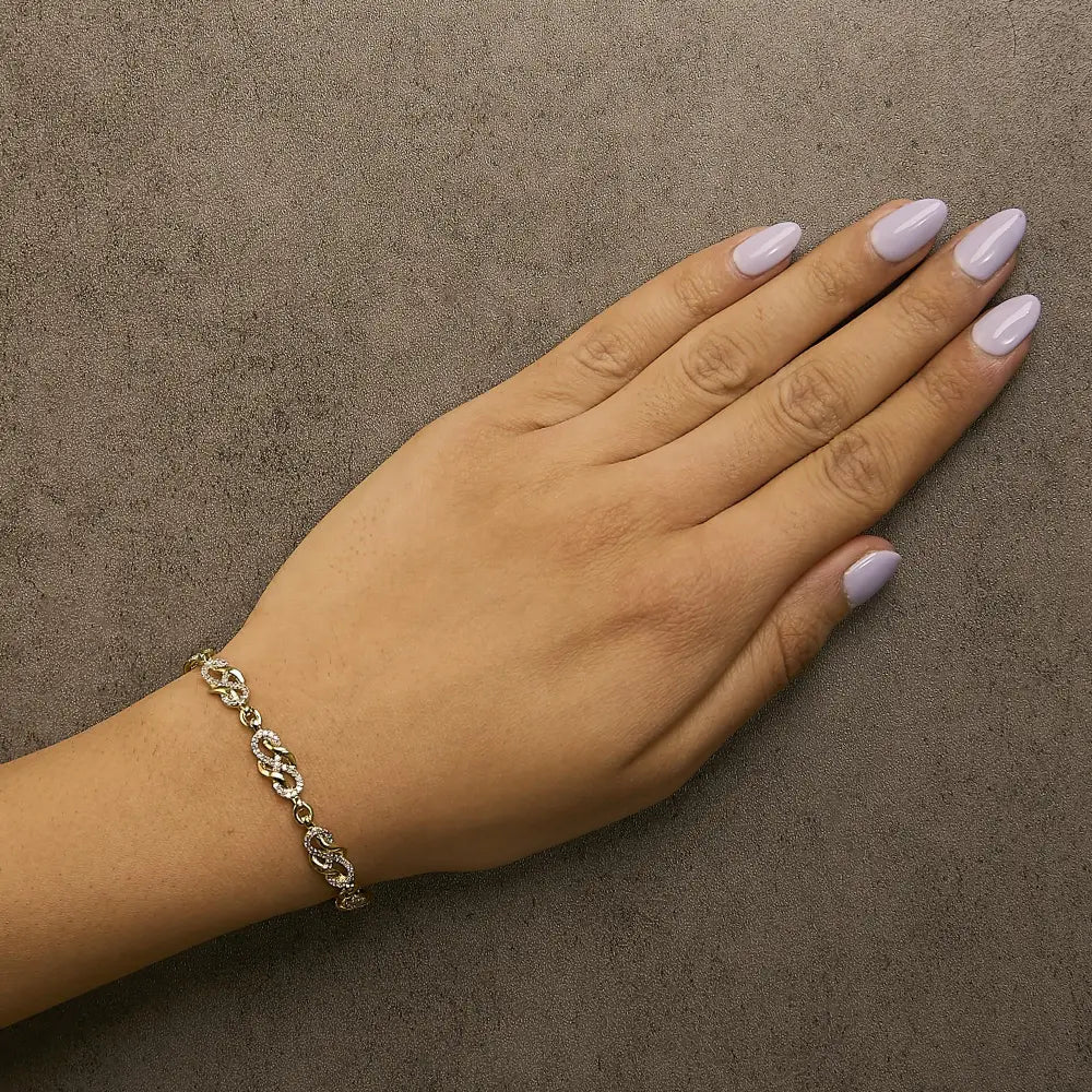 1.0 cttw diamond infinity swirl bracelet in 14k gold over sterling silver bijoux-nyc direct