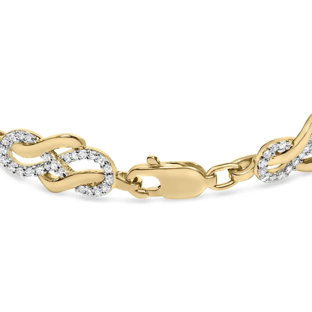 1.0 cttw diamond infinity swirl bracelet in 14k gold over sterling silver bijoux-nyc direct