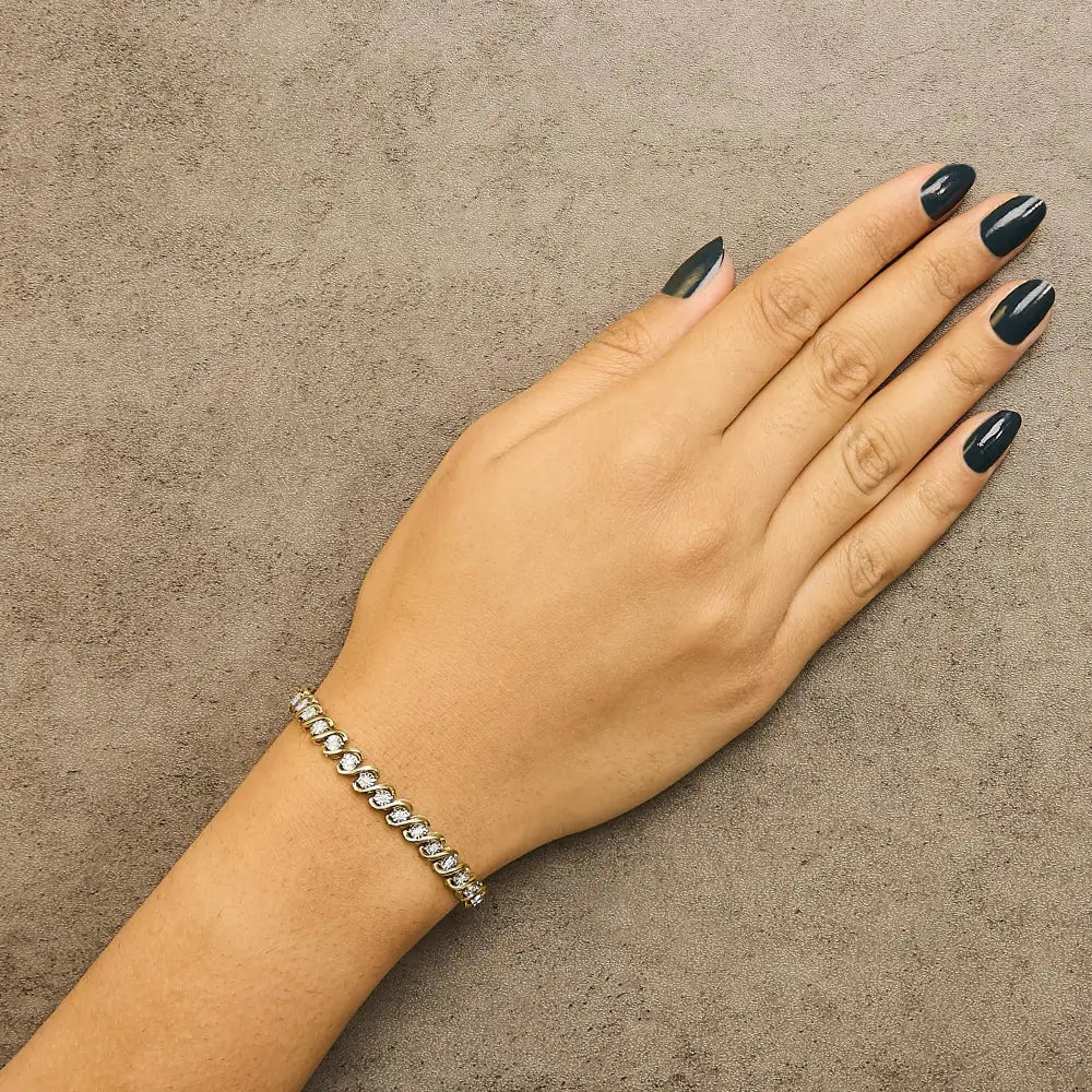 Diamond s-curve tennis bracelet in 14k gold plated sterling silver