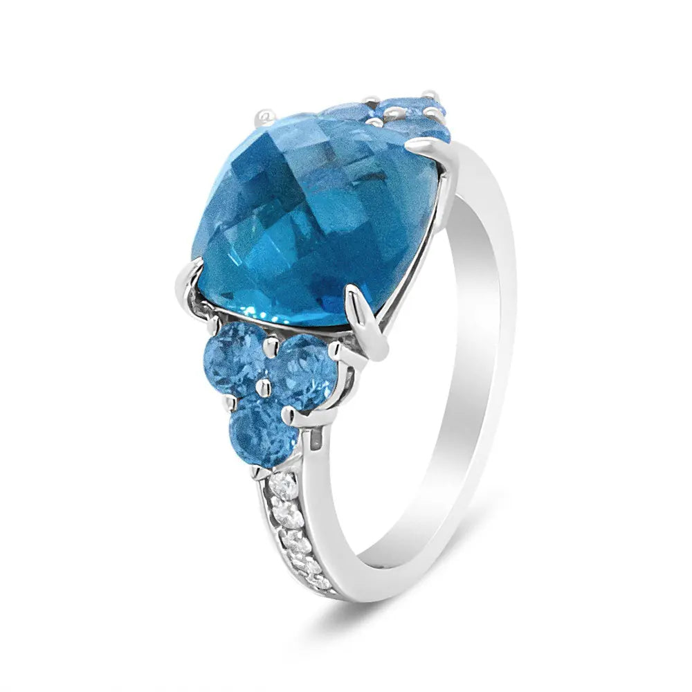 18K White Gold 10mm Cushion Shaped Blue Topaz and 1/6 Cttw Diamond 3 Stone Style Ring (F-G Color, VS1-VS2 Clarity) - Bijoux-NYC Direct