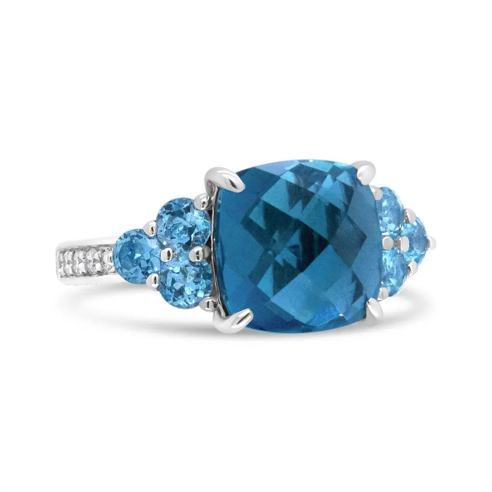 18K White Gold 10mm Cushion Shaped Blue Topaz and 1/6 Cttw Diamond 3 Stone Style Ring (F-G Color, VS1-VS2 Clarity) - Bijoux-NYC Direct
