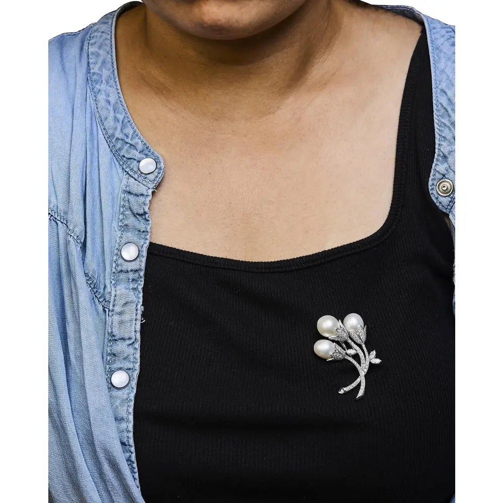 18k white gold floral brooch with south sea pearls and 2 1/5 cttw diamonds bijoux-nyc direct