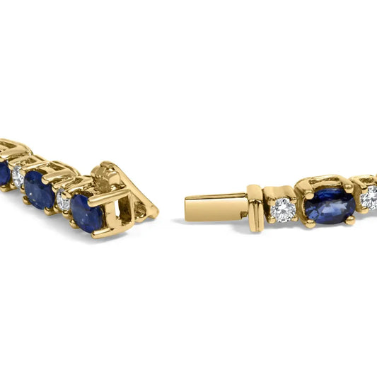 18k yellow gold 3/4 cttw diamond and 5 1/3 oval blue sapphire alternating link bracelet (g h color vs1 vs2 clarity) 7.25’’ inches