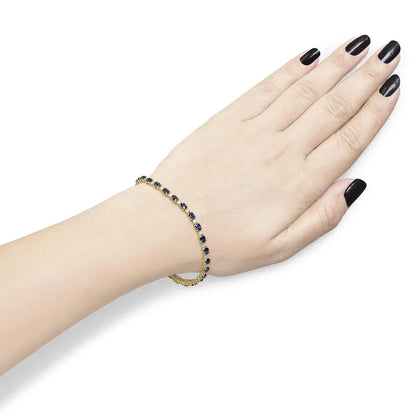 18k yellow gold 3/4 cttw diamond and 5 1/3 oval blue sapphire alternating link bracelet (g h color vs1 vs2 clarity) 7.25’’ inches