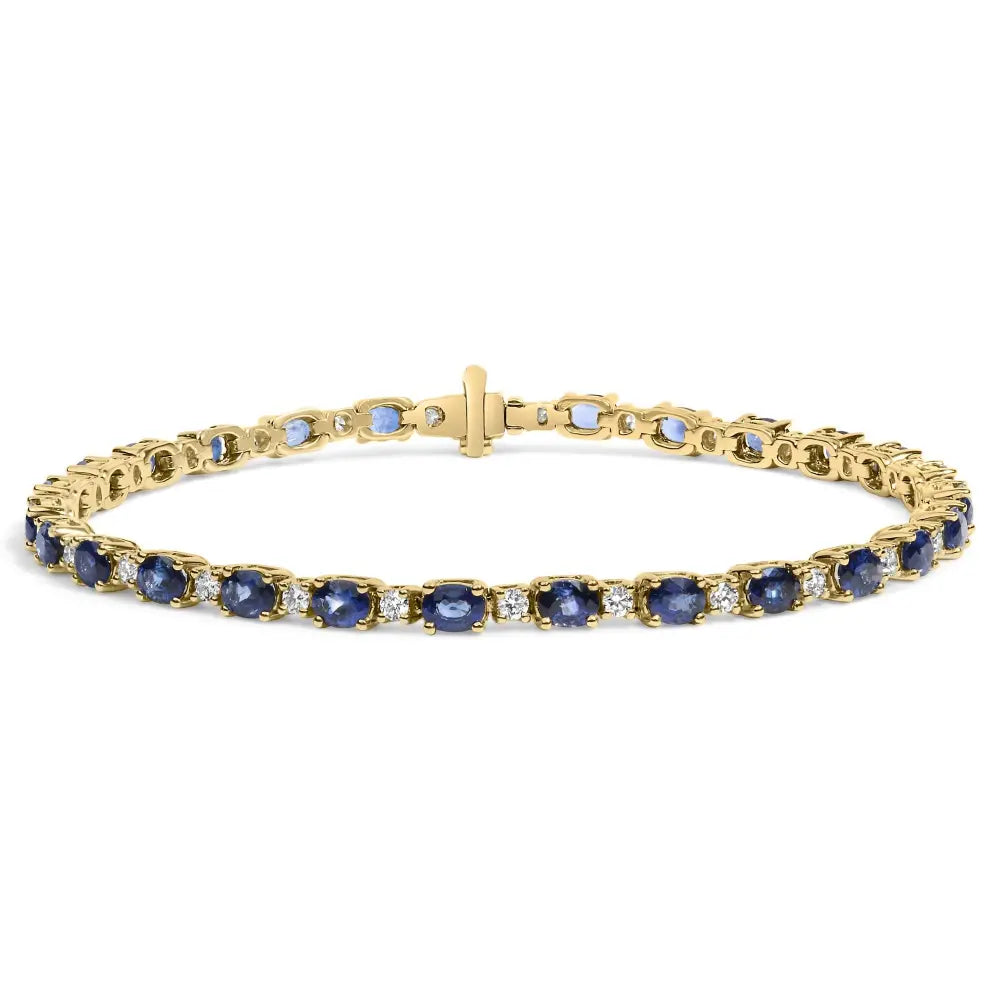18k yellow gold 3/4 cttw diamond and 5 1/3 oval blue sapphire alternating link bracelet (g h color vs1 vs2 clarity) 7.25’’ inches