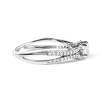 Diamond ring with a bow design on a white background