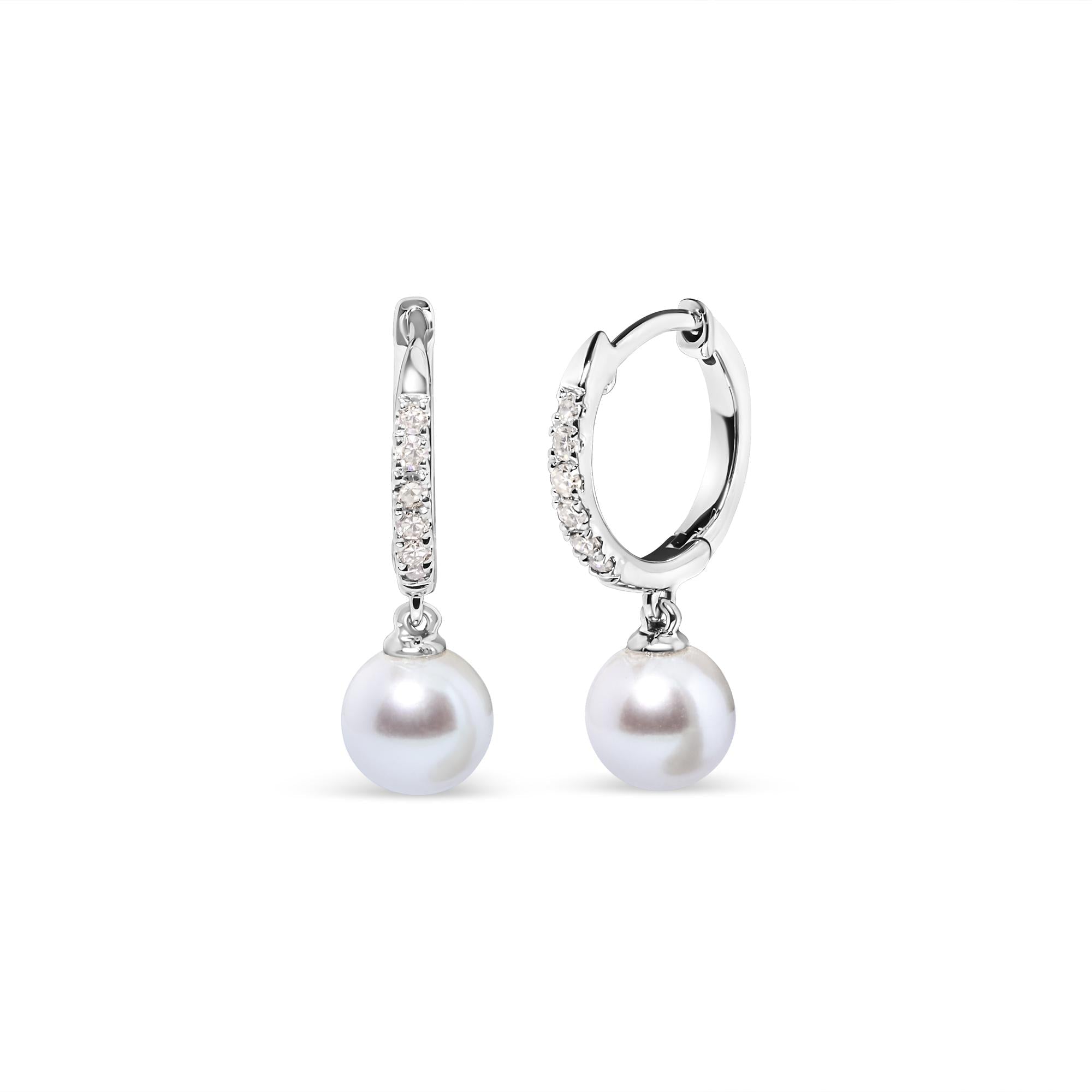 Pair of pearl earrings on a white background