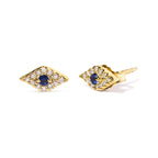 Gold earrings with blue gemstones on a white background