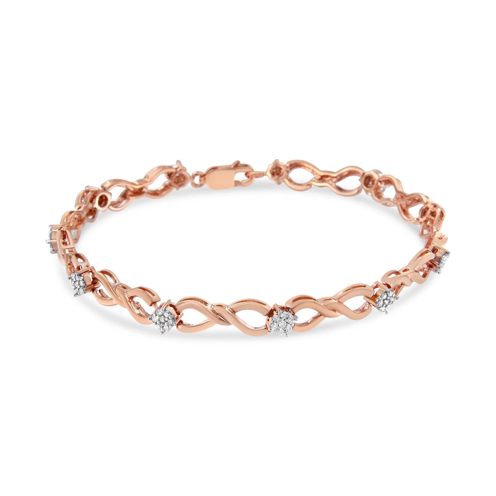 Rose gold bracelet with diamond accents on a white background