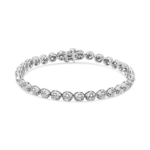 Silver bracelet with clear gemstones on a white background