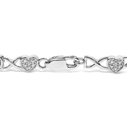 Silver bracelet with heart-shaped links on a white background