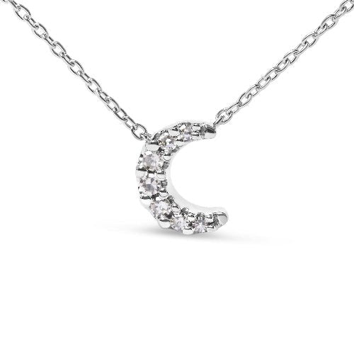 Silver necklace with a crescent moon pendant on a white background