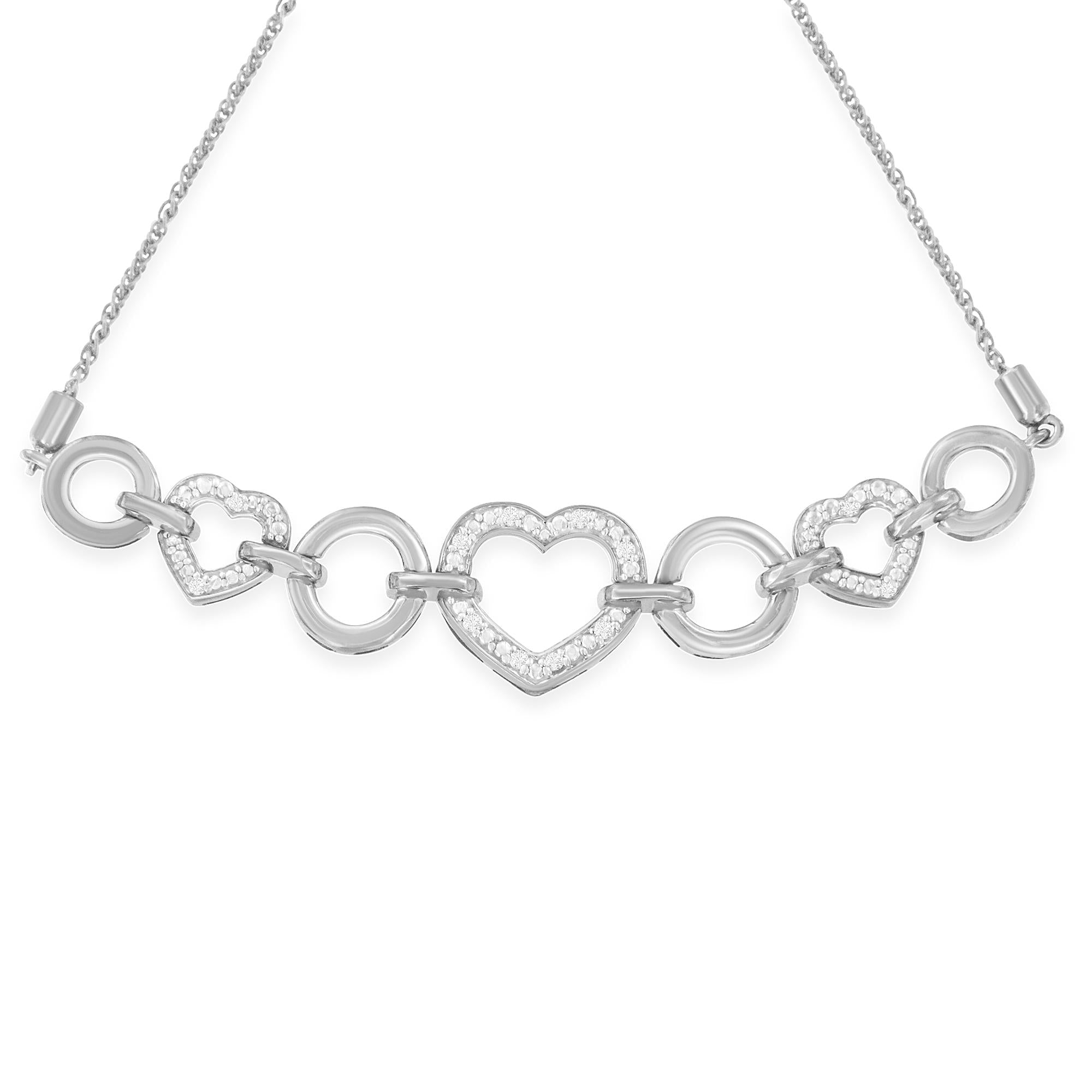 Silver necklace with heart-shaped links on a white background