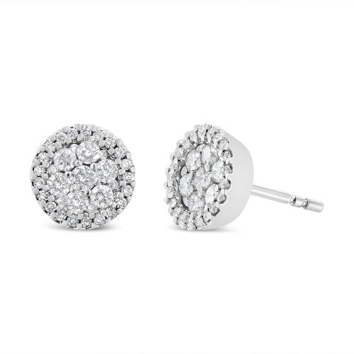 Pair of silver stud earrings with clear gemstones on a white background