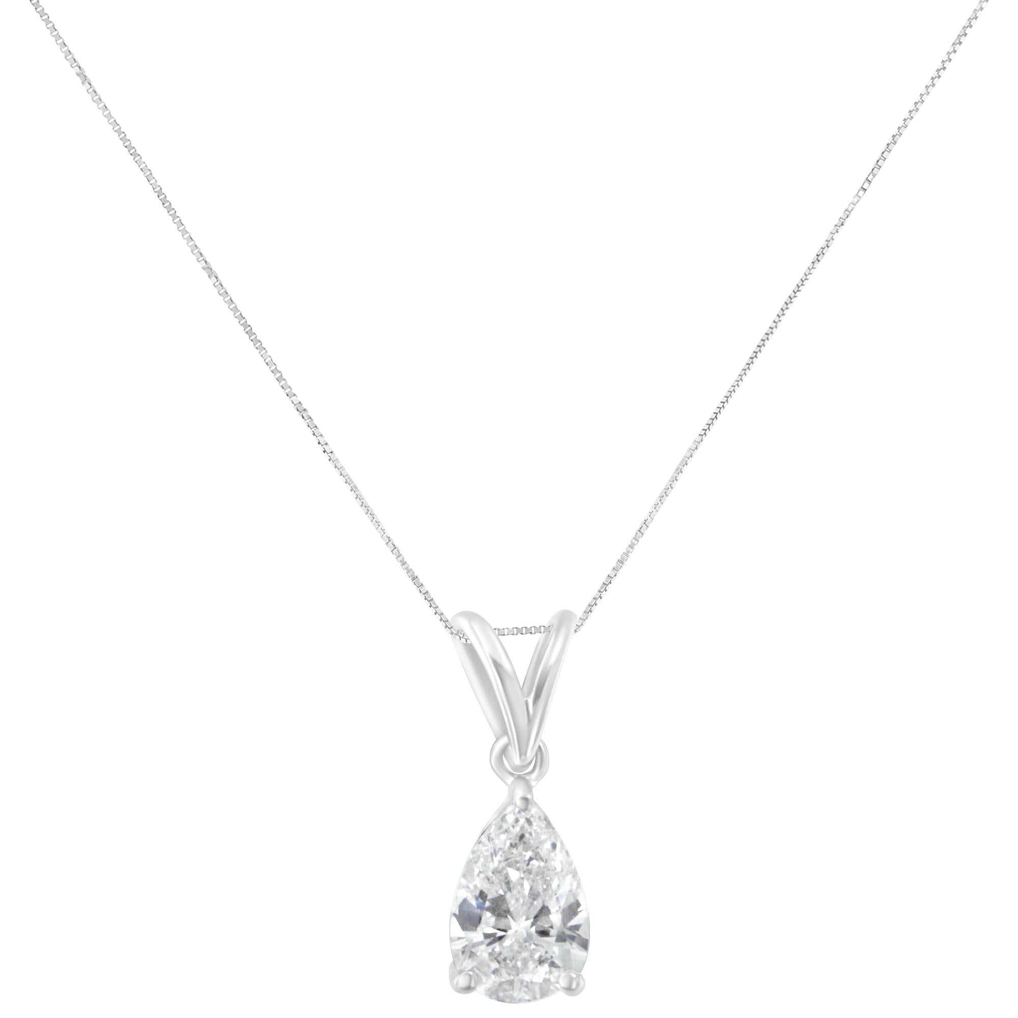 Teardrop-shaped IGI certified diamond pendant on a white background