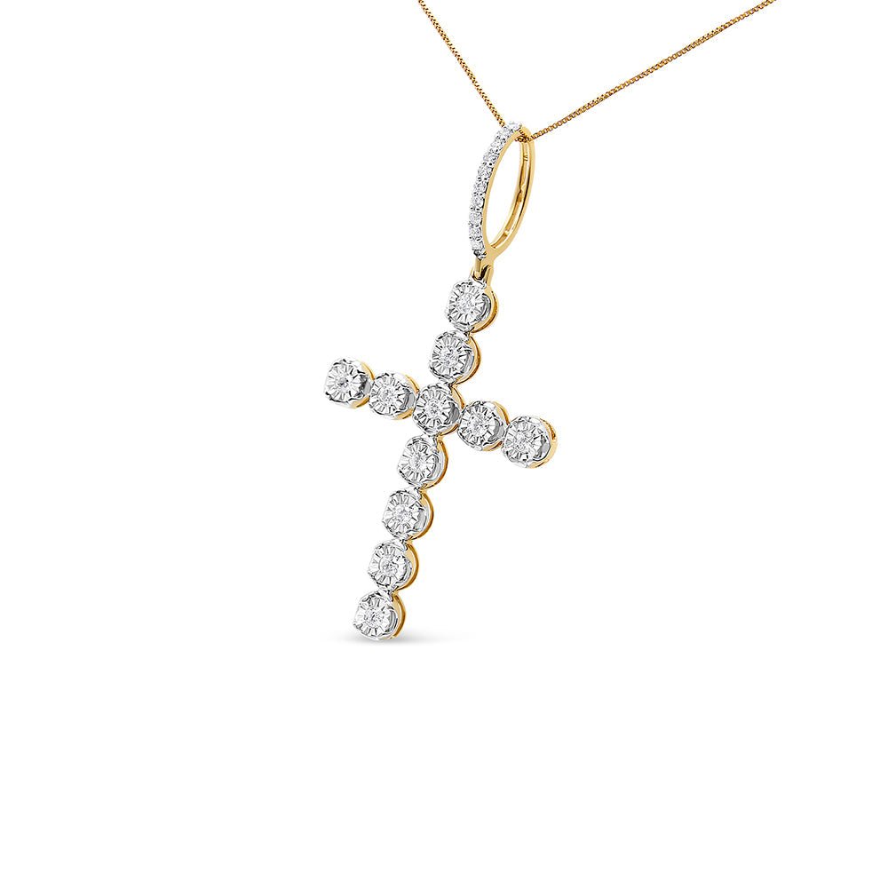 Gold and diamond cross pendant on a white background