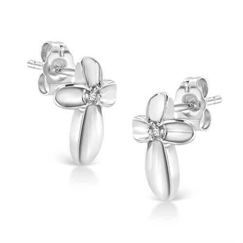 Silver flower-shaped earrings on a white background