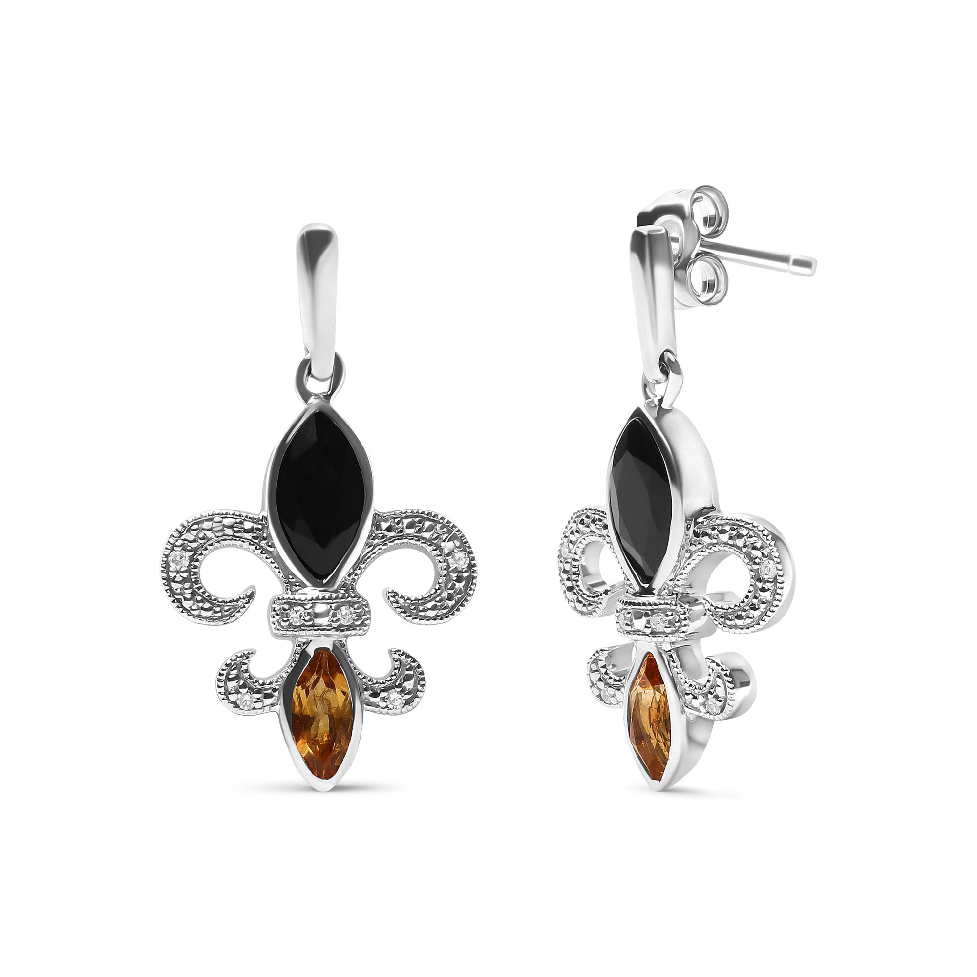 Pair of earrings with black and amber stones on a white background