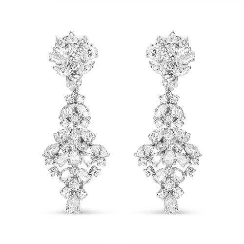 Pair of diamond earrings on a white background