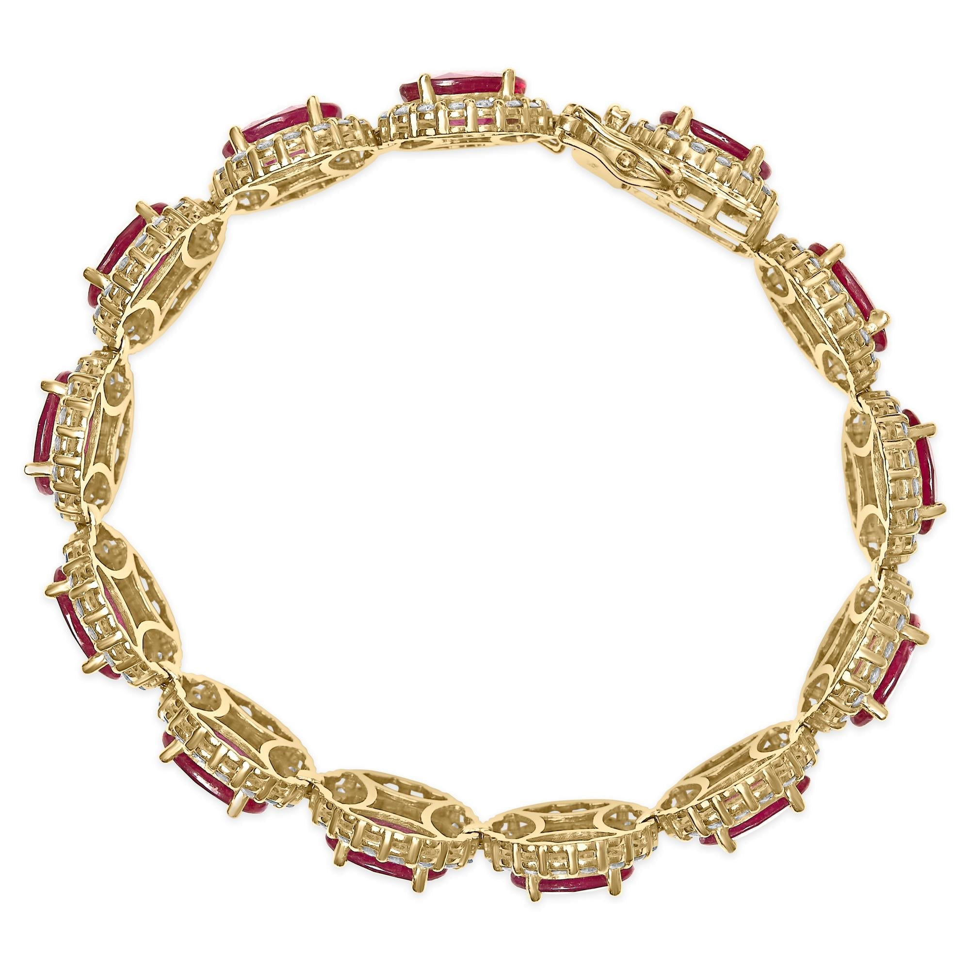 Gold bracelet with red gemstones on a white background