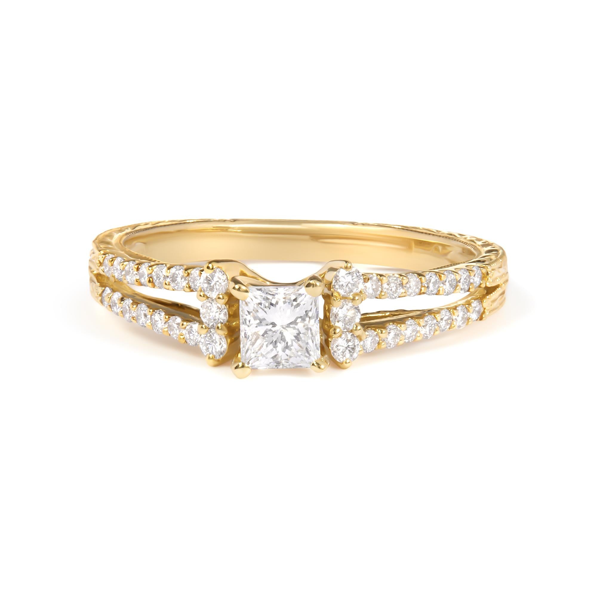 Engagement gold ring with a diamond on a white background