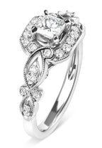 Silver ring with a central diamond and smaller stones on a white background