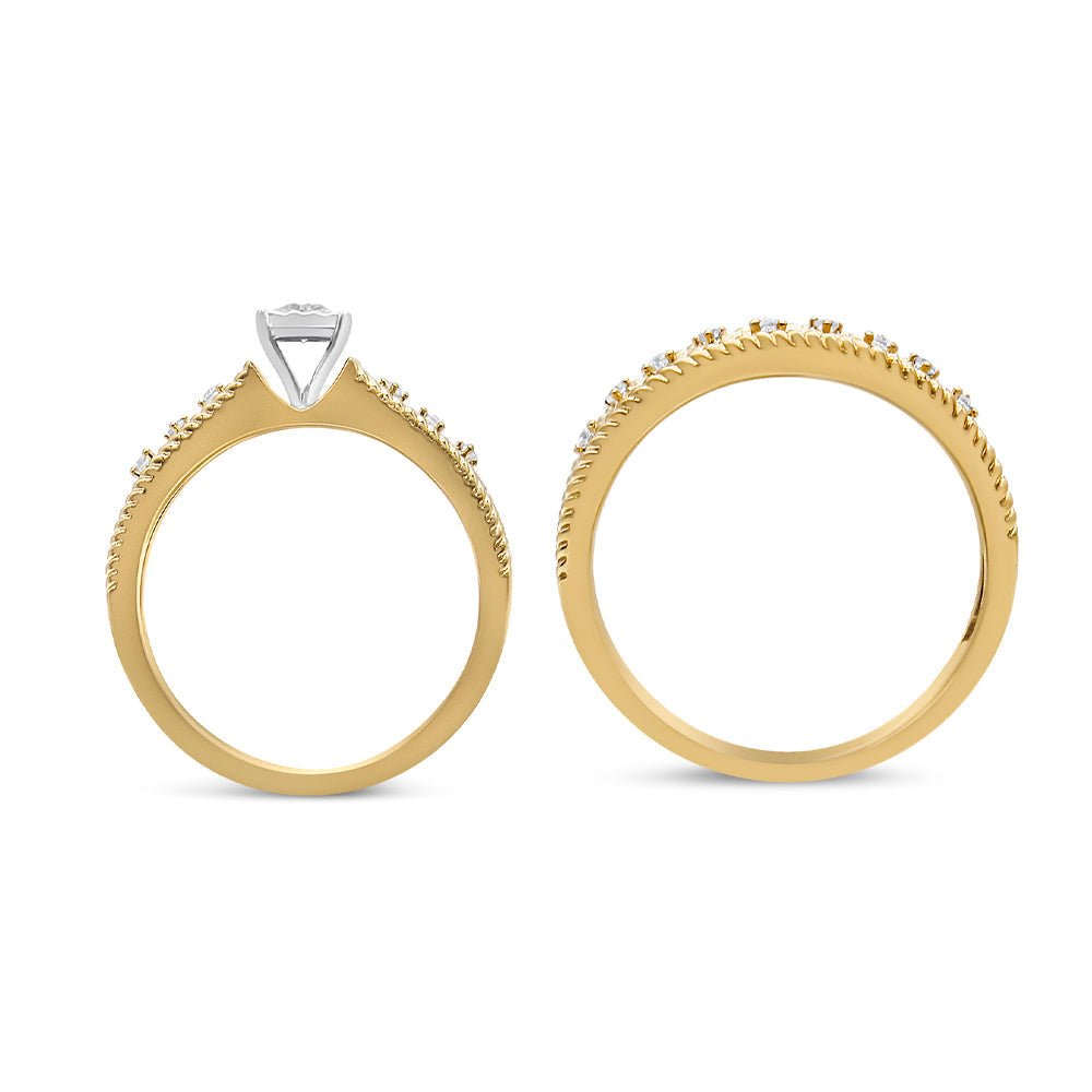 Two gold rings with intricate designs on a white background