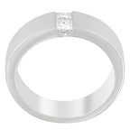 Silver ring with a diamond on a white background