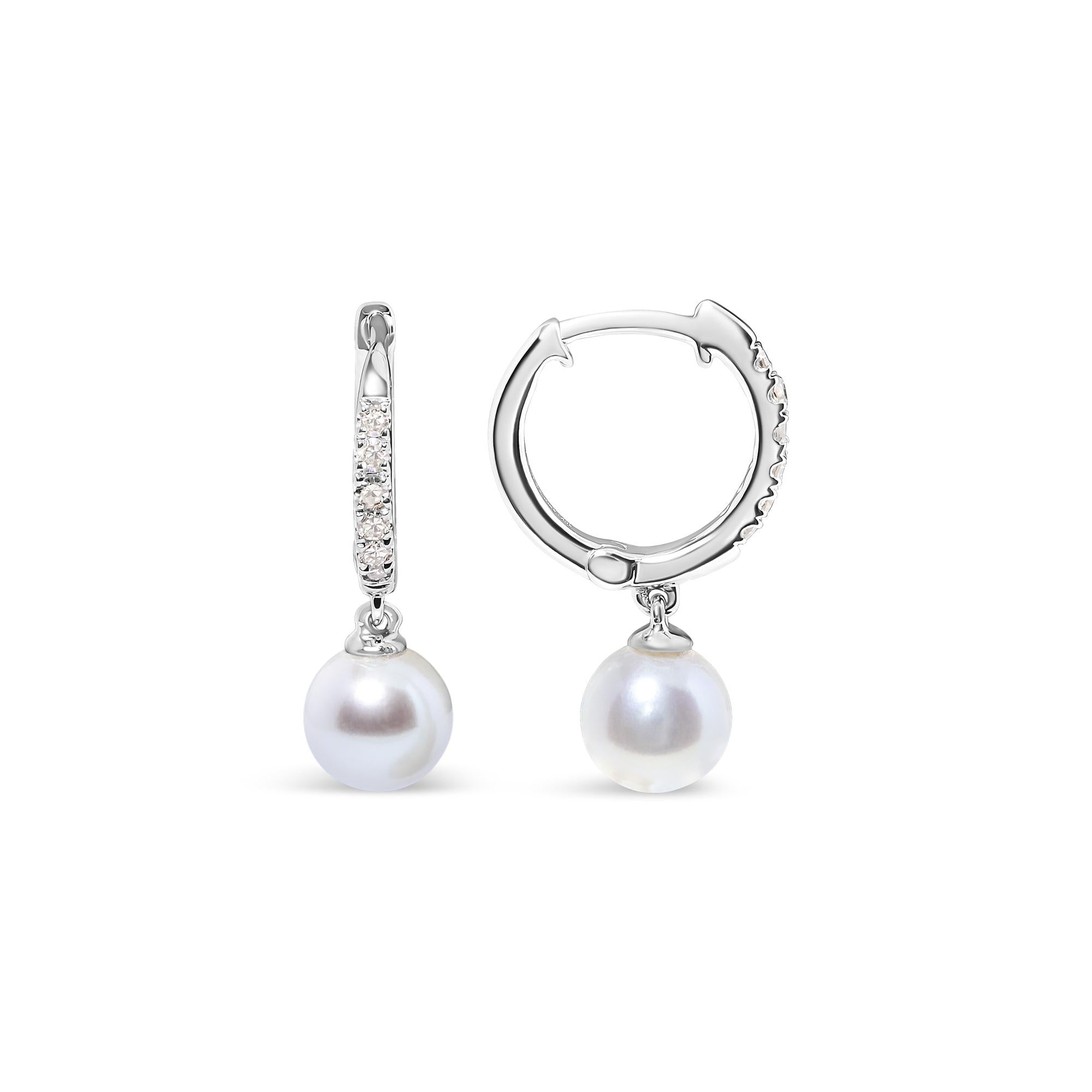 Pair of pearl earrings on a white background