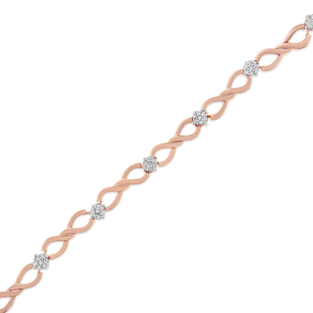 Rose gold bracelet with diamond accents on a white background