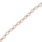 Rose gold bracelet with diamond accents on a white background