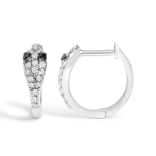 Pair of silver hoop earrings with black and clear gemstones on a white background