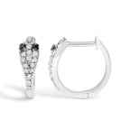 Pair of silver hoop earrings with black and clear gemstones on a white background