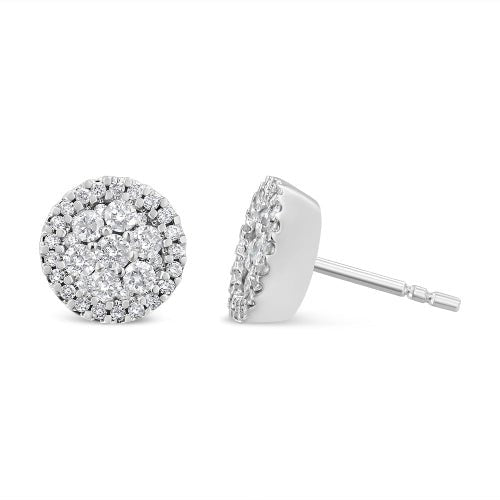 Silver stud earrings with clear gemstones on a white background